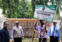 Pengangkatan Sita Eksekusi atas objek tanah dan bangunan yang berada di Kelurahan Mangunharjo dan Kelurahan Kademangan